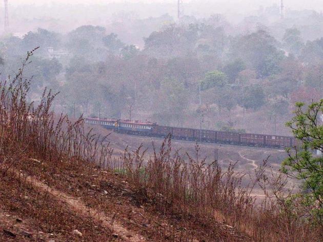 Train vanishing round the bend
