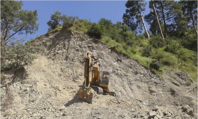 Destruction of mountainside by road widening Destruction of mountainside by road widening